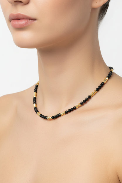 KRE PRIME women's gold-plated necklace with black beads, featuring a luxurious opulence design for elegant style.