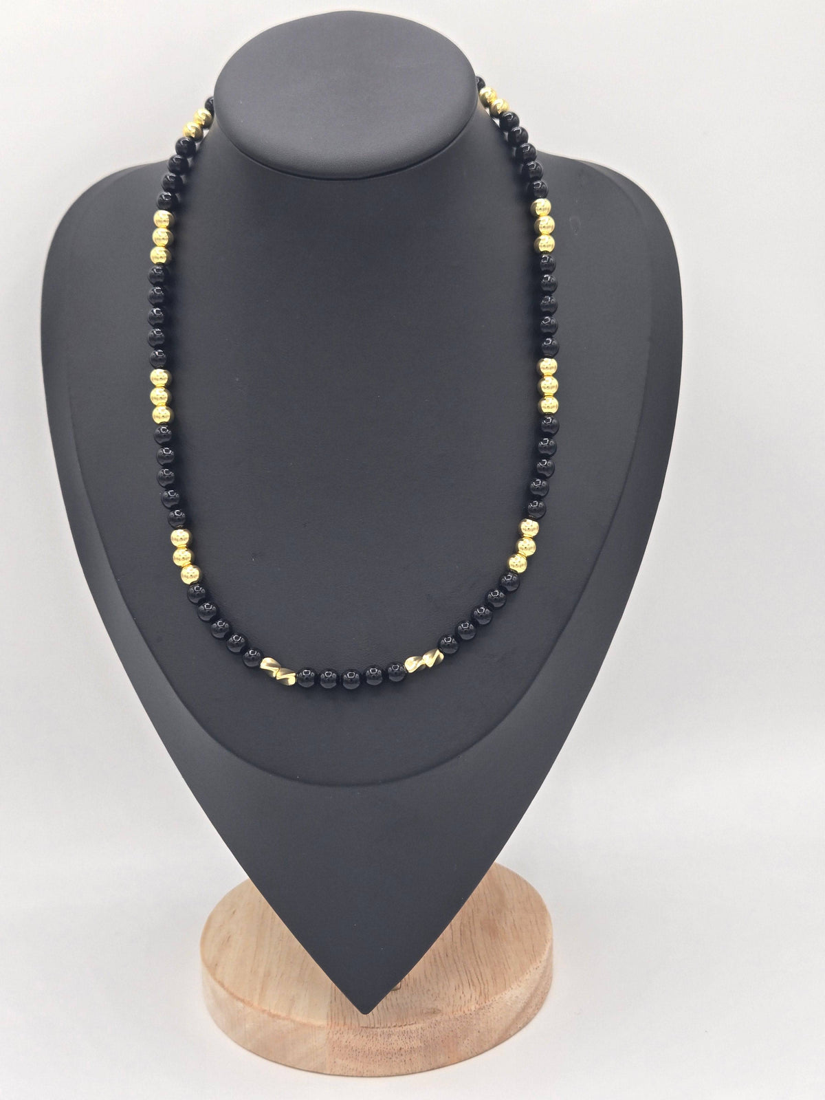 KRE PRIME women's 18K gold plated black beads opulence necklace with elegant beaded design and gold accents.