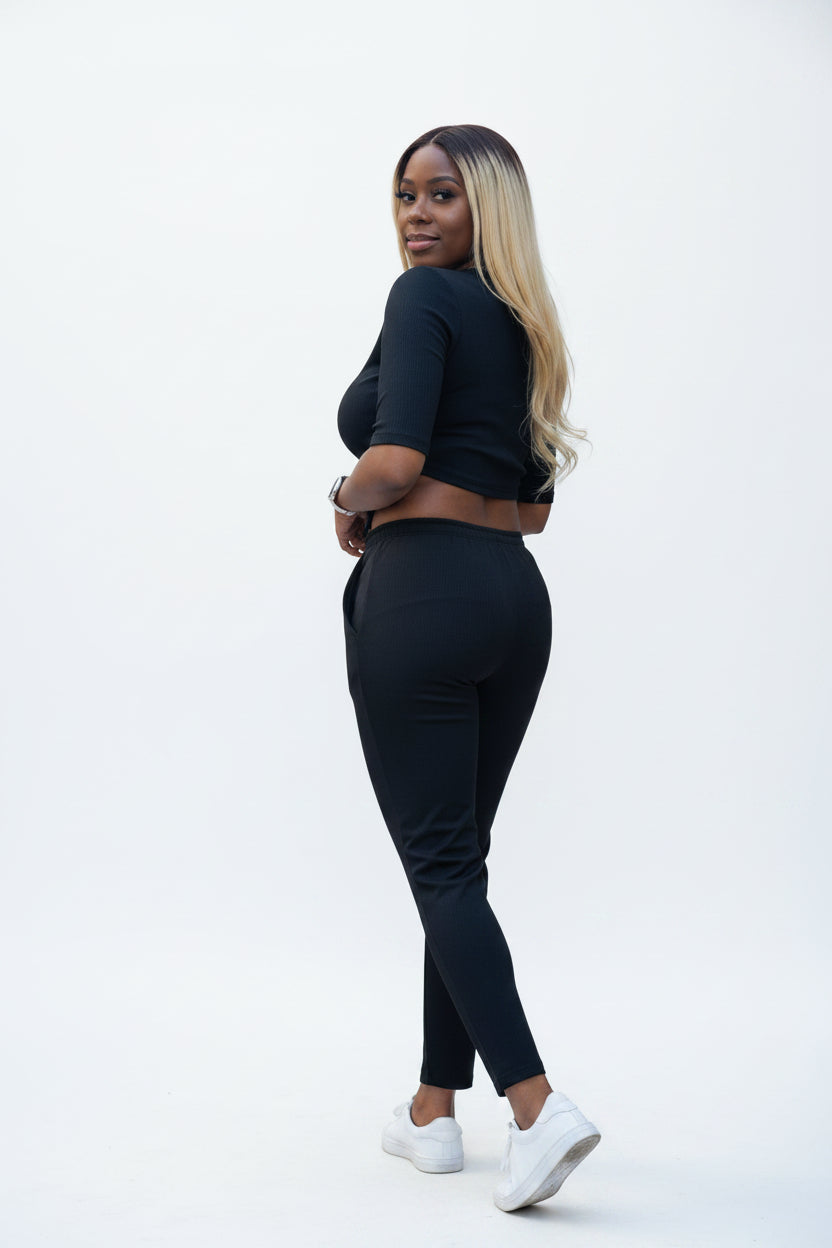 KRE Prime black convertible jumpsuit with two interchangeable tops, made of stretch polyester and spandex.