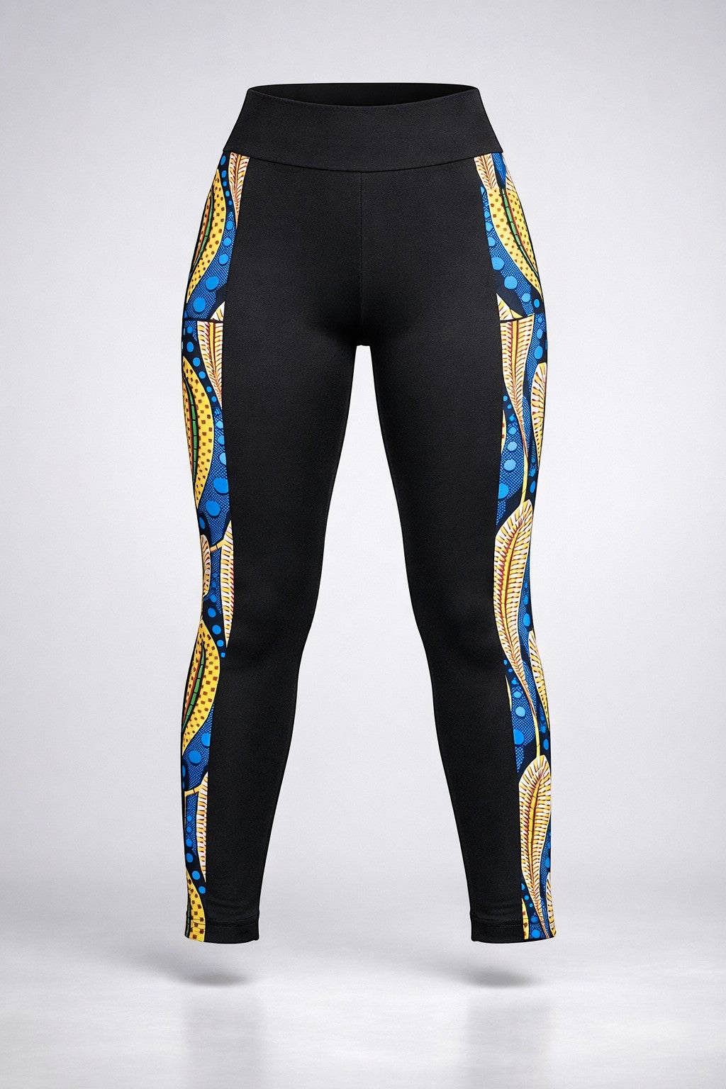 KRE Prime black leggings with colorful peacock feather side panel design and pockets. Made from polyamide and spandex.