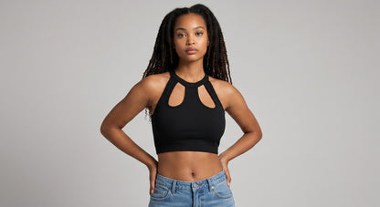 KRE PRIME black ribbed crop top with cut-out detail and halter neck, made from polyester and elastane blend.