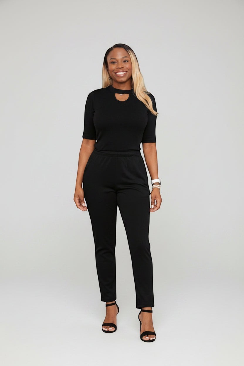 KRE Prime women's black convertible jumpsuit with keyhole neckline and black side stripe detail. 