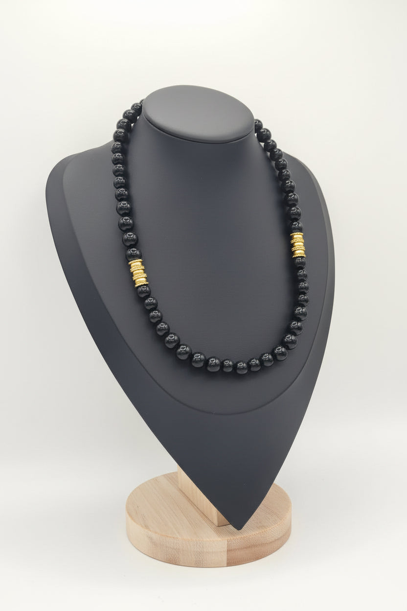 KRE Prime Men 18-inch Eclipse Bead Necklace featuring sleek black beads and a polished silver clasp.