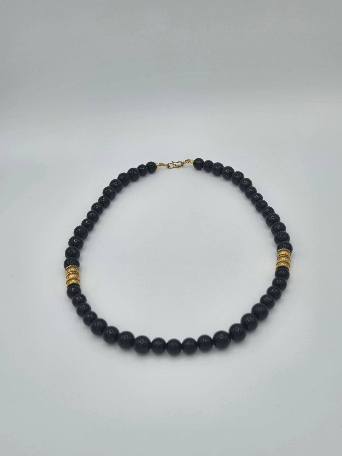 KRE Prime Men 18-inch Eclipse Bead Necklace featuring black beads on a silver chain, stylish men's jewelry accessory.