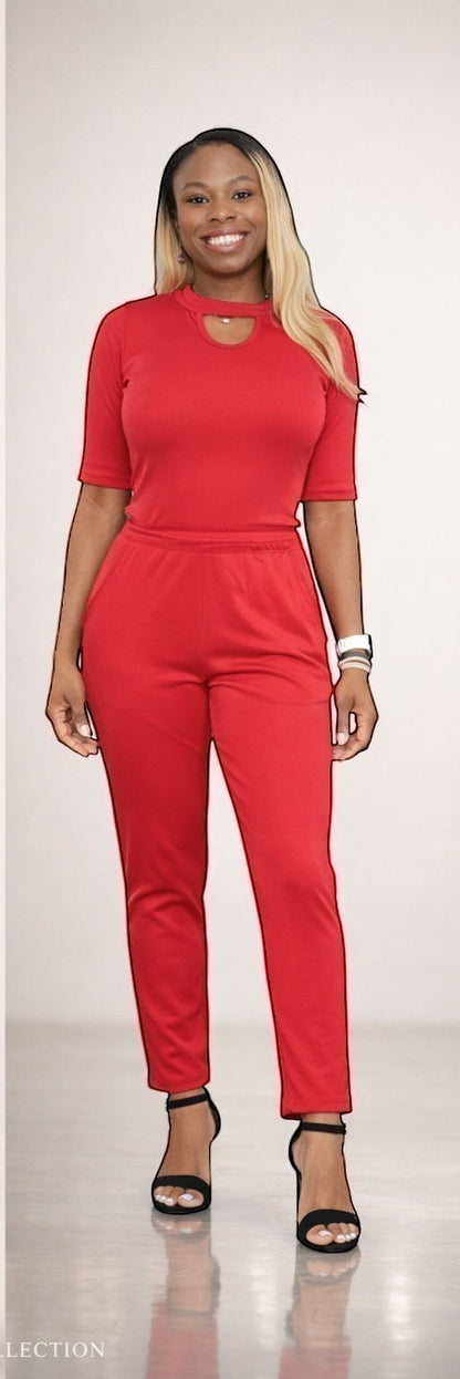 KRE Prime red convertible jumpsuit with keyhole neckline and elastic waist pants. Made of polyester and spandex.