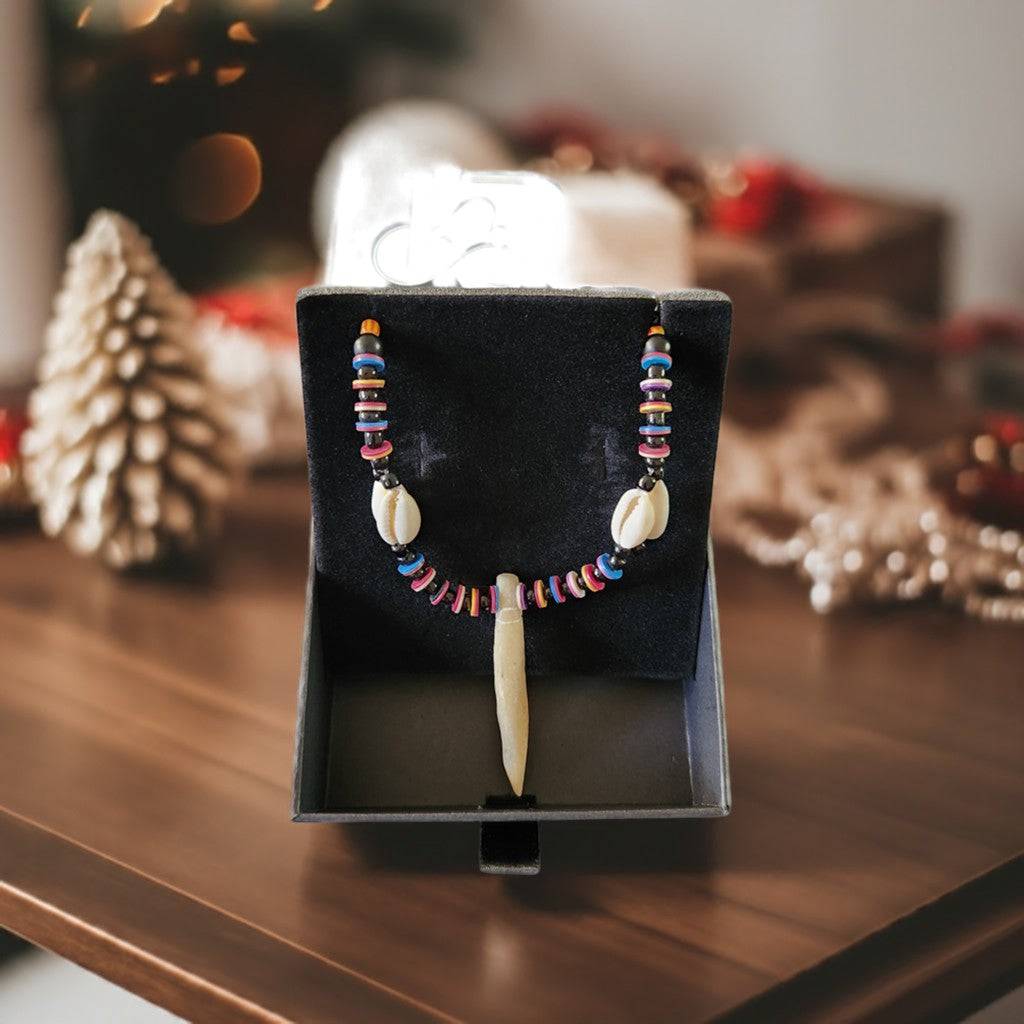 Unisex tribal-inspired beaded pendant necklace by KRE PRIME featuring colorful beads and a detailed central pendant.