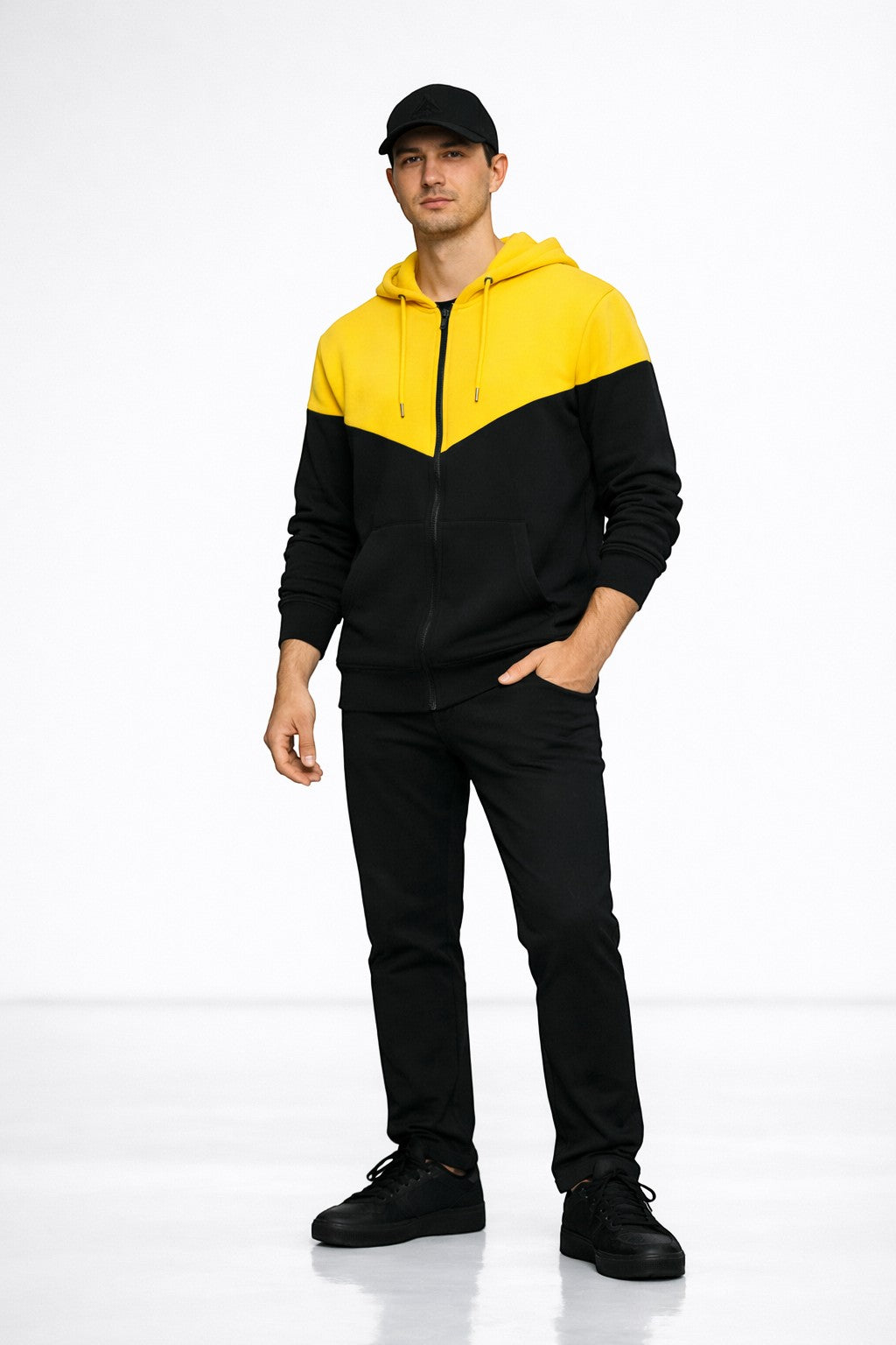 KRE Prime Unisex zip-up hoodie in black with a yellow chevron design on the chest. Features a kangaroo pocket and drawstring hood.
