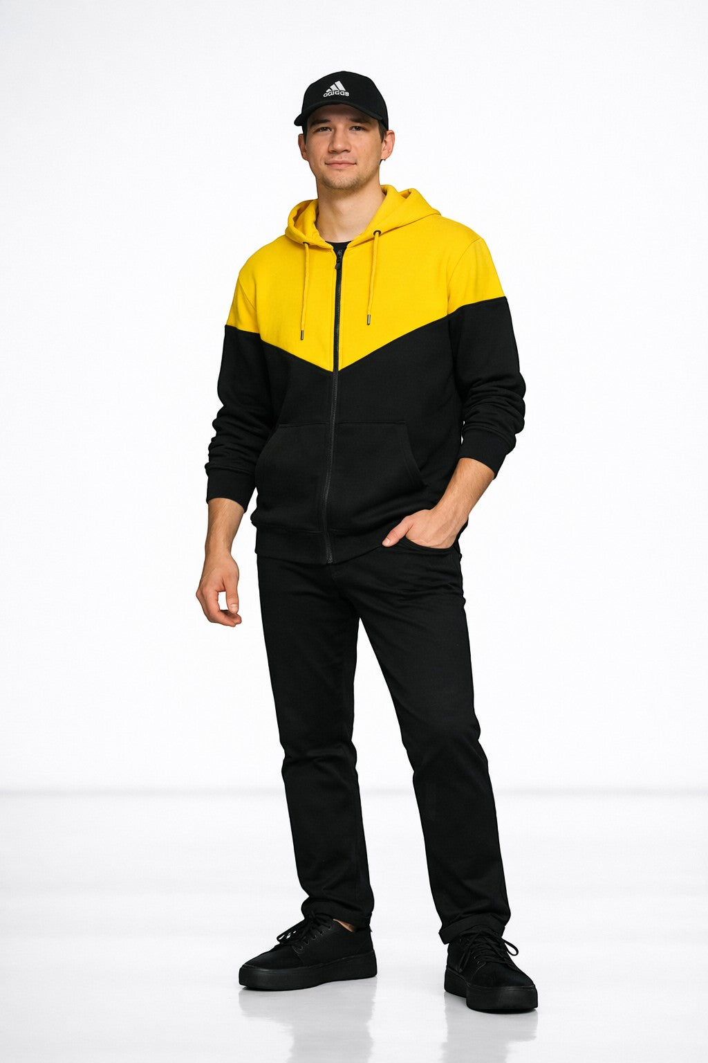 KRE Prime Unisex zip-up hoodie in black and yellow colorblock with kangaroo pocket and drawstring hood.