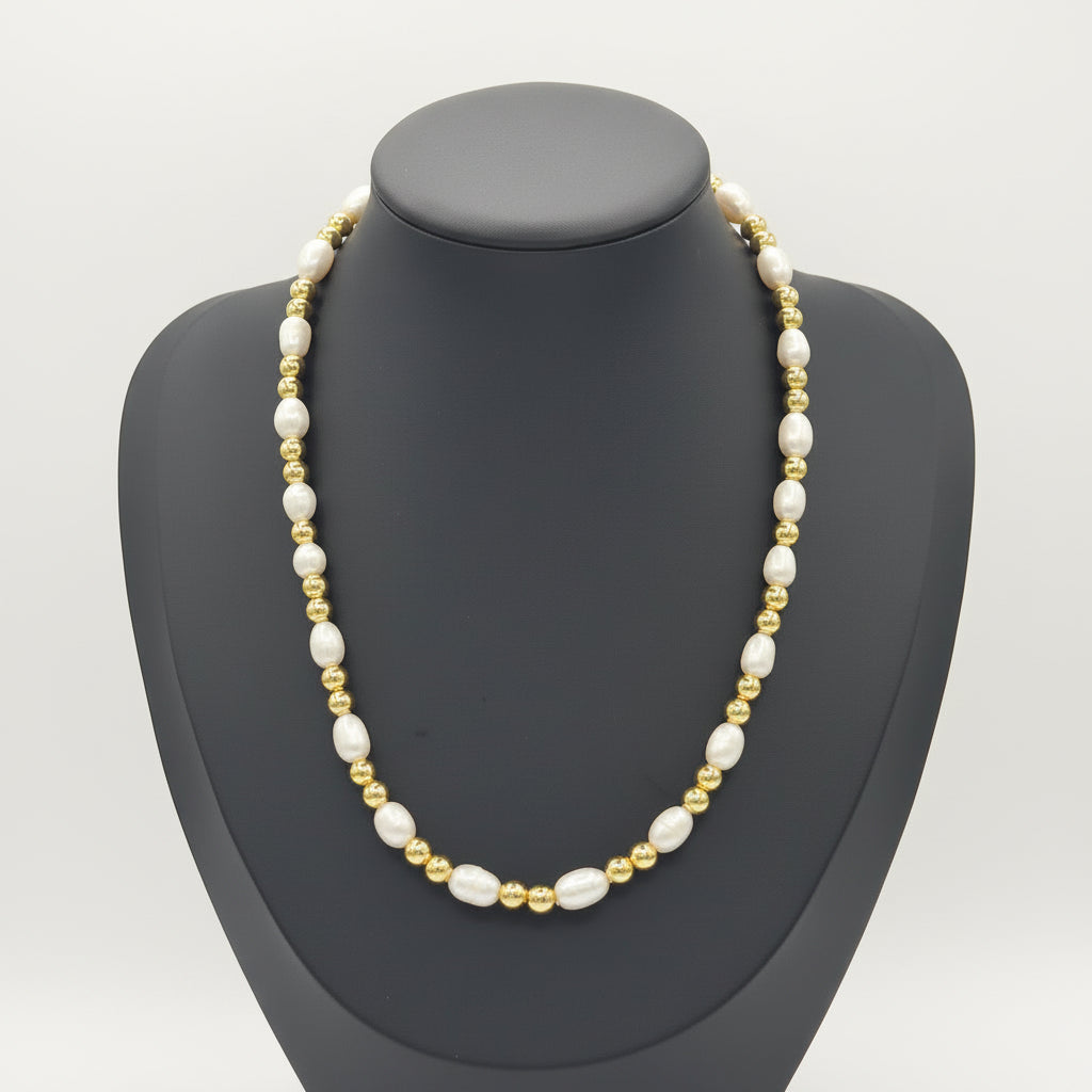 KRE PRIME women’s freshwater pearl necklace featuring a string of lustrous natural pearls on a delicate chain.
