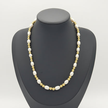 KRE PRIME women’s freshwater pearl necklace featuring a string of lustrous natural pearls on a delicate chain.