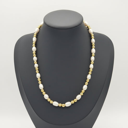 KRE PRIME women’s freshwater pearl necklace featuring a string of lustrous natural pearls on a delicate chain.