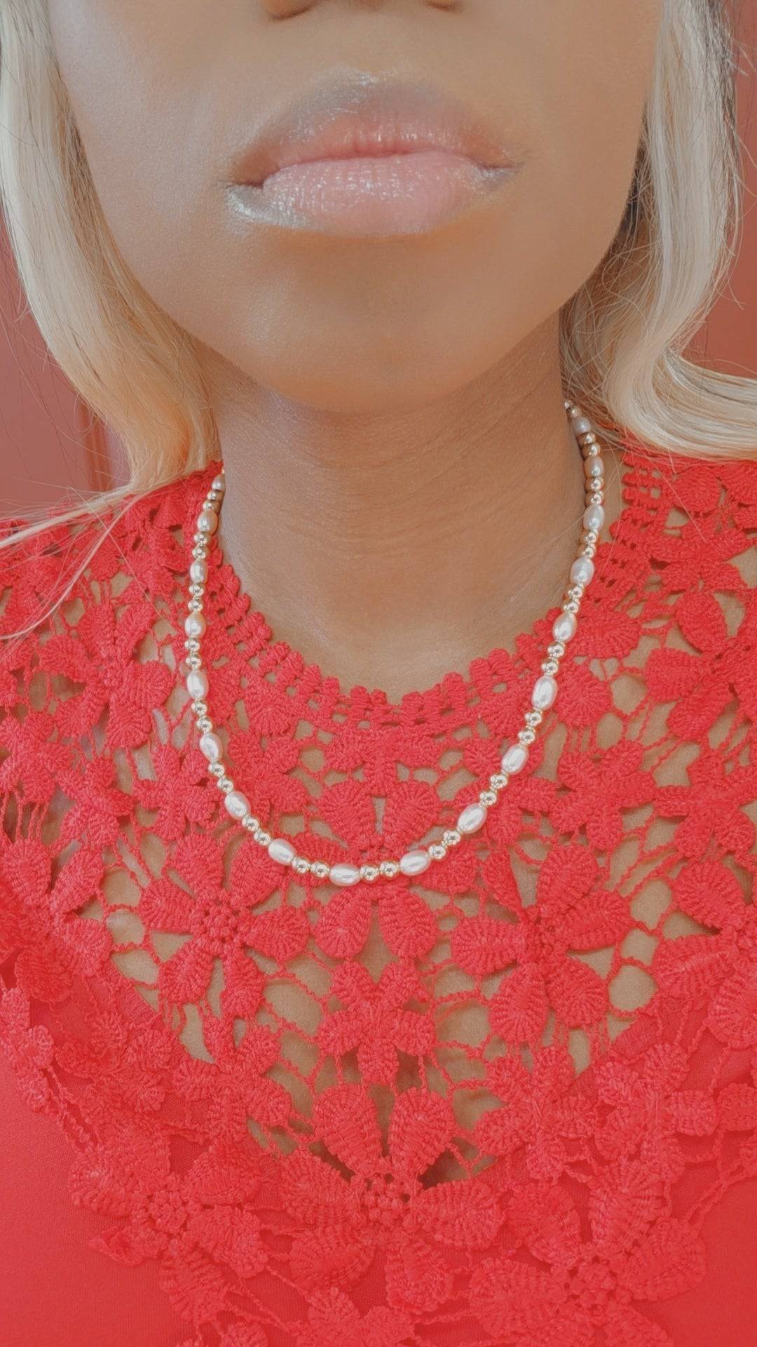 KRE PRIME women's freshwater pearl necklace with elegant, natural pearls on a delicate chain, showcasing refined jewelry craftsmanship.