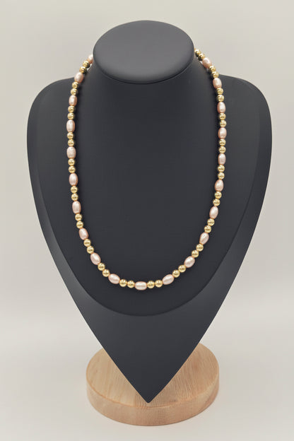 KRE PRIME women's freshwater pearl necklace featuring a string of elegant natural pearls on a delicate chain.