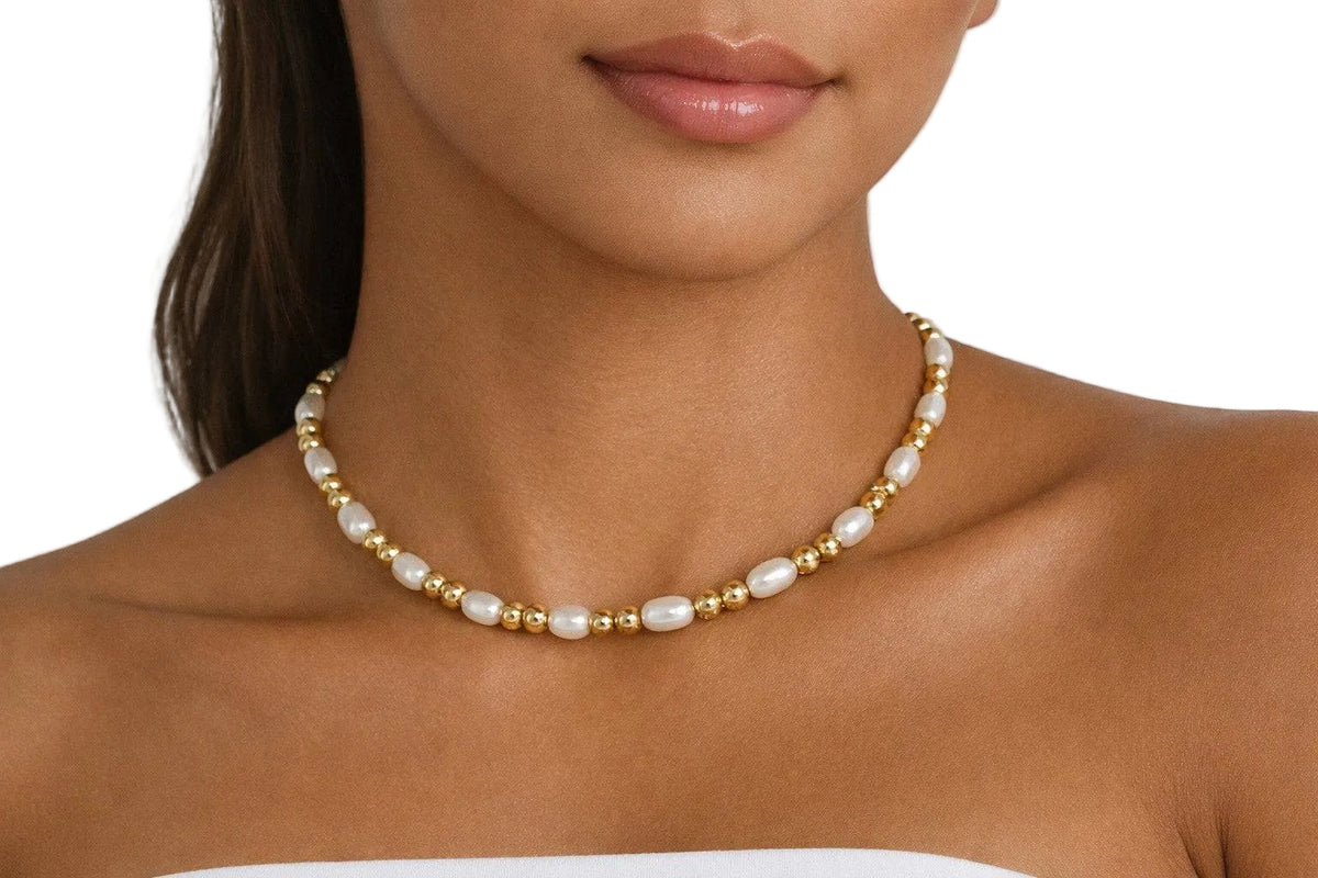 KRE PRIME women's freshwater pearl necklace featuring elegant, natural pearls on a delicate chain.