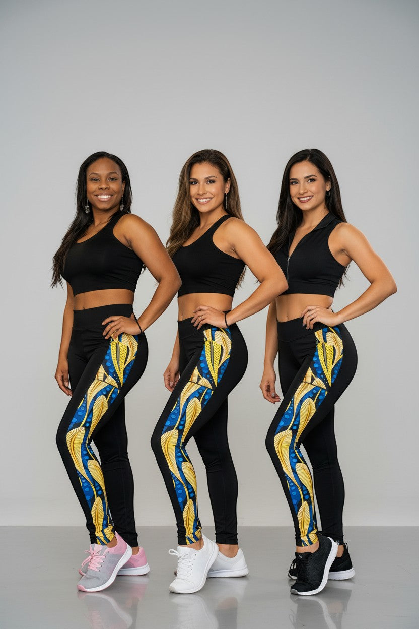 KRE Prime women's black leggings with blue and yellow peacock feather print down the side. Made of polyamide and spandex.
