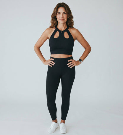 KRE PRIME women's dark grey ribbed crop top with cutout details and halter neck, featuring a sophisticated, form-fitting design.