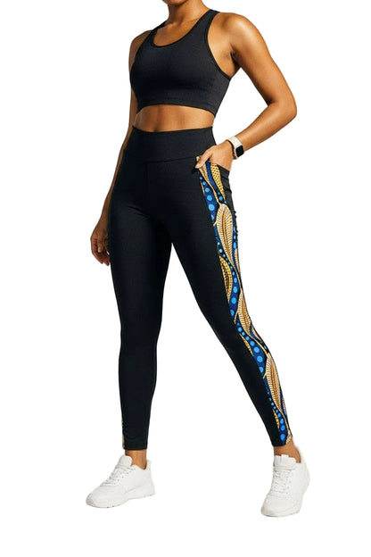 KRE PRIME women's activewear leggings with black peacock print, featuring side pockets for comfortable fitness and casual wear.