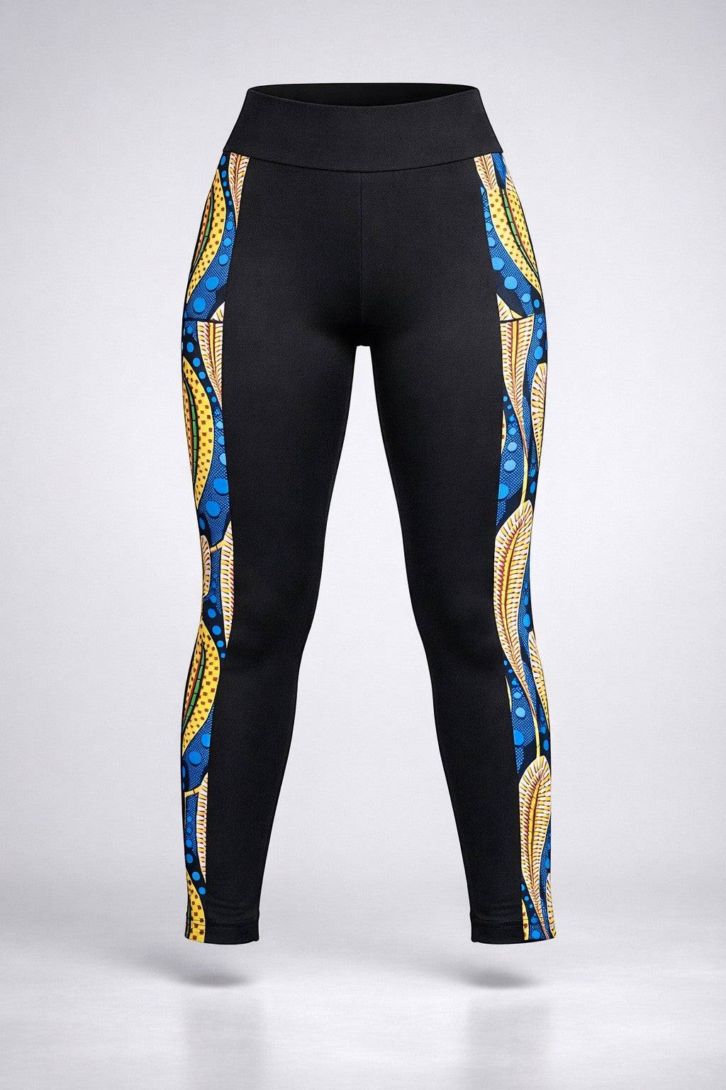 KRE PRIME women's black activewear leggings with peacock design and side pockets, made for comfortable workout wear.