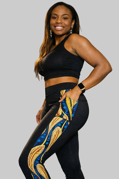 KRE PRIME women's black activewear leggings with printed pocket design, stretchy fabric, and comfortable fit for workouts.