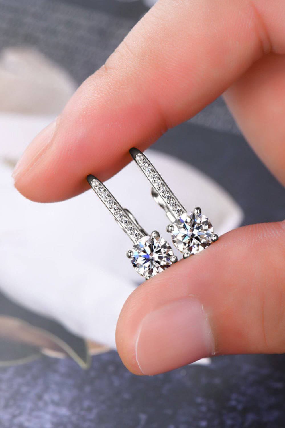 KRE PRIME women’s 2-carat moissanite earrings in sterling silver, showcasing sparkling gemstones and elegant design.