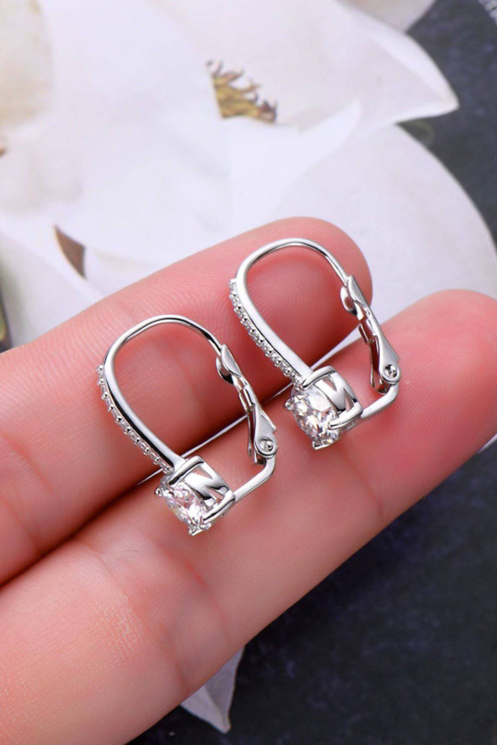 KRE PRIME women’s 2-carat moissanite sterling silver earrings with sparkling gemstone accents and elegant design.